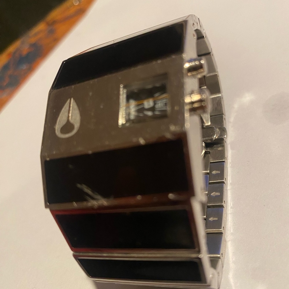 Rotolog Nixon Silver and Black Watch with Unique Design
